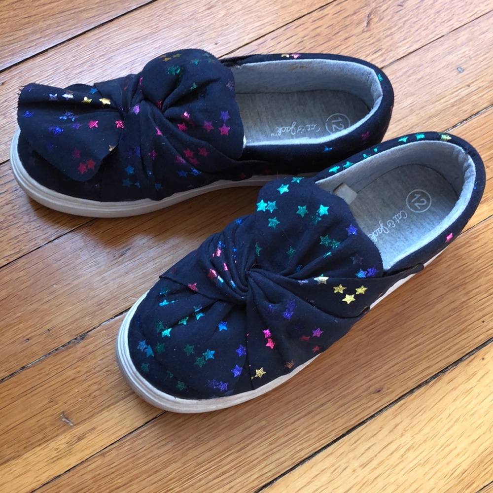 Black foil star slip-on sneakers